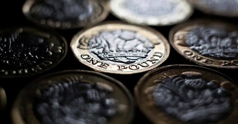 UK's Economic Challenges Could Be Eased by a Declining Currency