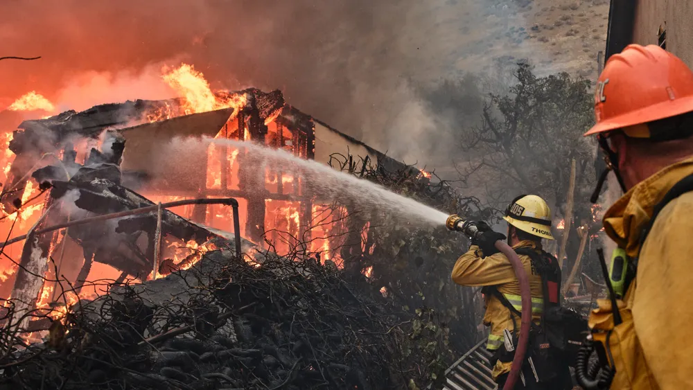 Uncontrolled Wildfires Sweep Through Southern California