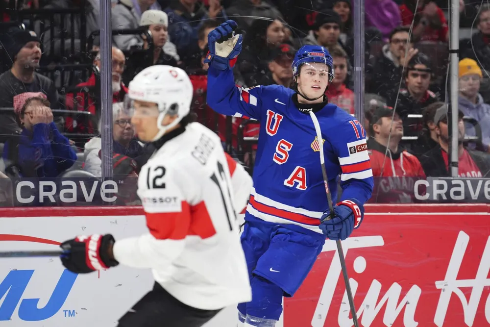 US dominates Switzerland 7-2 in world junior quarterfinals