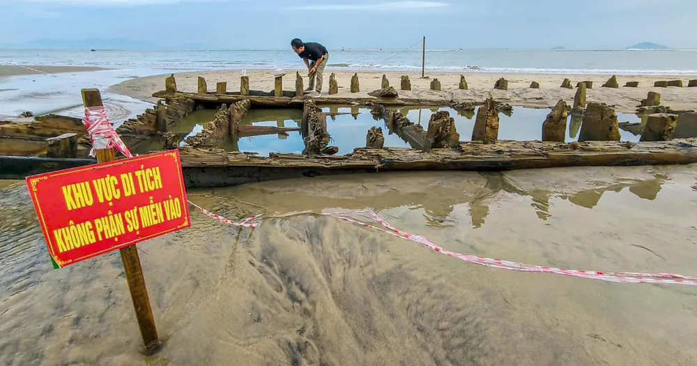 Vietnam's ancient shipwreck emerges following Typhoon Kalmaegi's coastal erosion