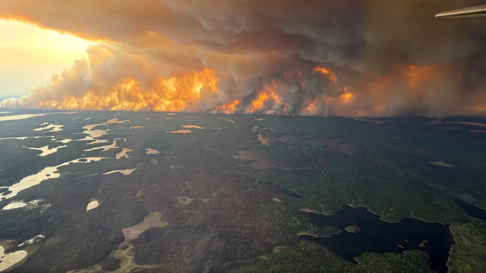 Wildfires Force Evacuation of 17,000 Residents in Manitoba, Canada