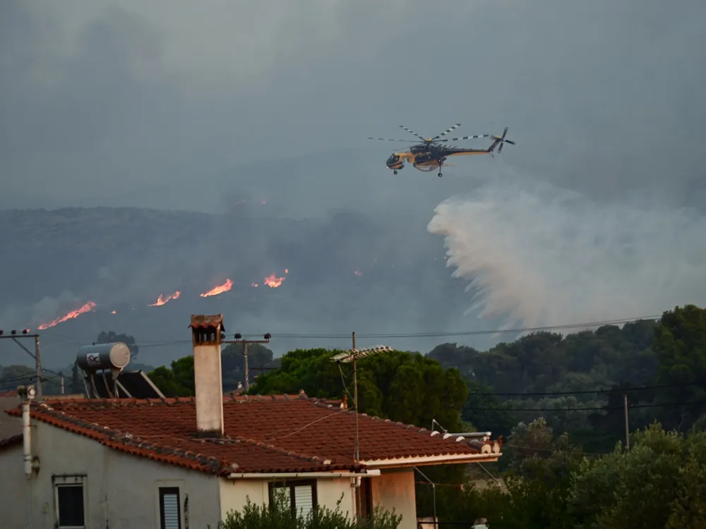 Wildfires Rage Near Athens, Leaving One Dead Amid Evacuations